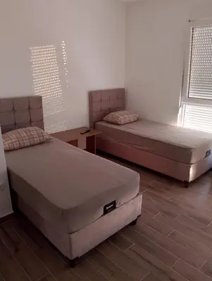 two beds in a room with two beds sidx sidx sidx at Amare2 in Inđija