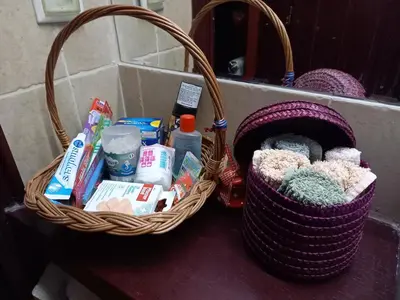 a basket sitting on top of a counter with toiletries at Mirara in Belgrade