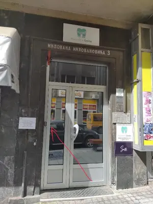 a door with a red tape on it in a building at Boho-Style Apartment in the city center in Belgrade