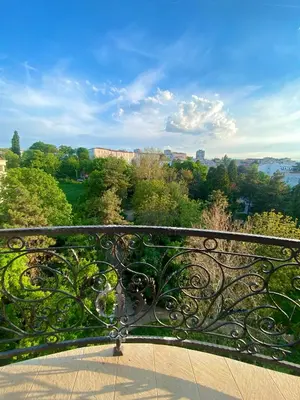 a view of a park from a balcony at Lux apartment with a park view in Belgrade