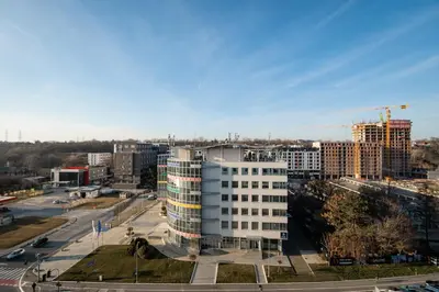 an aerial view of a city with tall buildings at Monza in Belgrade