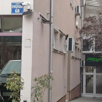 a building with a sign on the side of it at Lola 2 in Belgrade