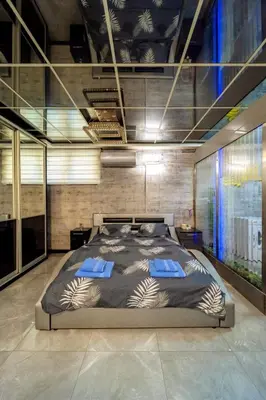 a bedroom with a large bed in a room at Aqualux Apartment with garage in Belgrade