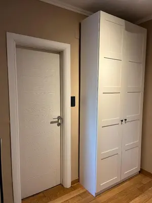a room with a white door and a closet at City Centre Apartment 3 in Belgrade