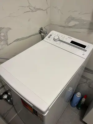 a white sink in a bathroom next to a counter at City Centre Apartment 3 in Belgrade
