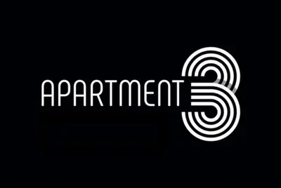 a white logo with the word argument and a spiral at City Centre Apartment 3 in Belgrade