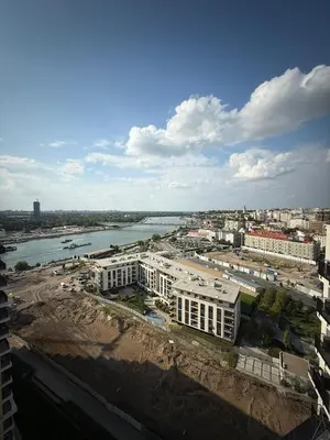 a view of a city with a river and buildings at Penthouse with River View BW in Belgrade