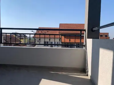 a balcony with a view of a building at airport Belgrade 2bedrooms in Surčin