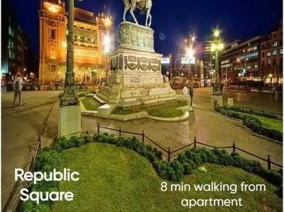 a large statue in a city at night at Apartment Center Belgrade in Belgrade