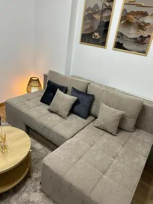 a living room with a couch and a table at Relax In in Belgrade