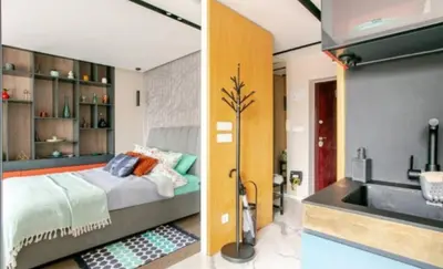 a bedroom with a bed and a sink at Mini Dorćolka apartment -Dorćol in Belgrade