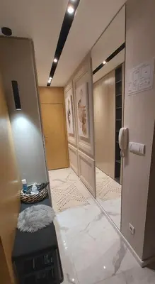 a room with a hallway with a mirror and a door at Mini Dorćolka apartment -Dorćol in Belgrade