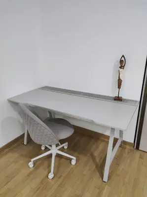 a white desk with a chair and a lamp at Premium Belvil apartment, free parking in Belgrade