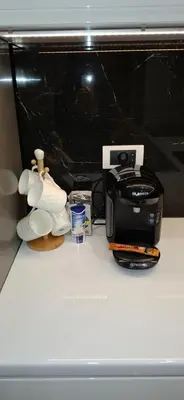 a counter top with a toaster and a toaster at Apartman Laki-M in Belgrade