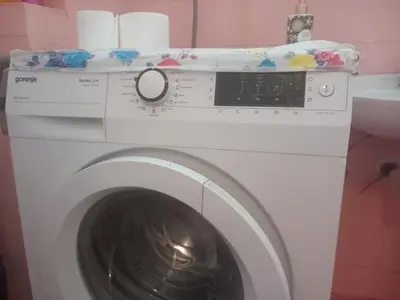 a washing machine with a towel on top of it at Djordje in Belgrade