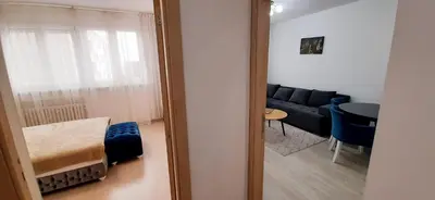a living room with a couch and a table at Apartman Vojvoda in Belgrade