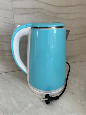 a blue and white mug sitting on the floor at Airport Art Villa in Surčin
