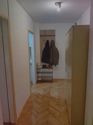a hallway of a room with a closet and a door at Apartman Tanja in Arandjelovac