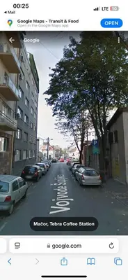 a screenshot of a picture of a street with cars parked at Za studente 15 marta in Belgrade