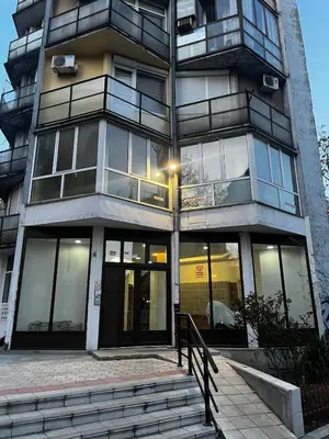 a tall building with a lot of windows at A tiny single room - Macchiato in Belgrade
