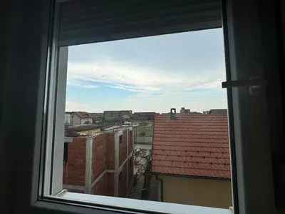 a view of a city from a window at Belgrade Airport Beds in Surčin