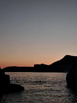 a sunset over a large body of water at Drago Sutomore 2025 in Borča