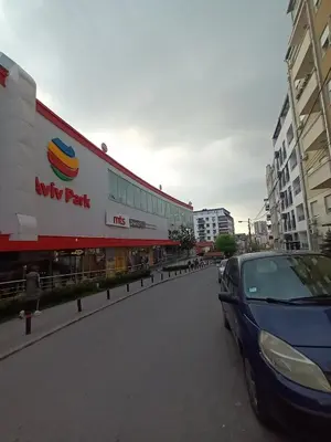 a car parked in front of a new fast food restaurant at Mama in Belgrade