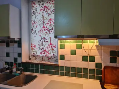 a kitchen with a sink and a window at Masha in Belgrade