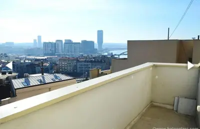 a view of a city from a balcony of a building at Vesna apartment in Belgrade
