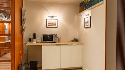 a kitchen with a counter top with a microwave at Apartment F14 in Belgrade