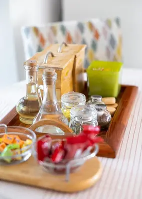 a table with a tray of food on a table at Emi Quiet & Cozy Stay in Belgrade