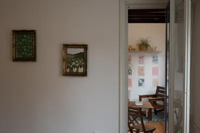 a room with a table and a mirror on a wall at Belgrade Urban Central Flat in Belgrade