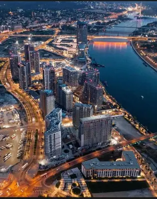 an aerial view of a city at night at Belgrade Waterfront Apartment in Belgrade