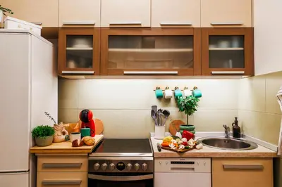a small kitchen with a sink and a stove at Aesthetic Home with Balcony 5min to Republic Square in Belgrade