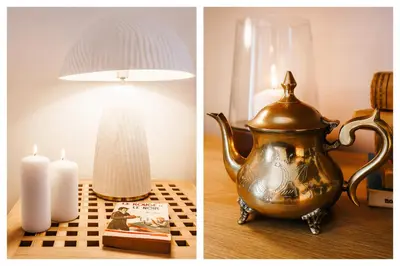 a table with a tea pot and a lamp and candles at Aesthetic Home with Balcony 5min to Republic Square in Belgrade