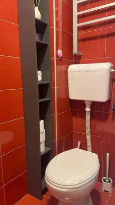 a bathroom with a white toilet in a room at Studio 77 in Belgrade