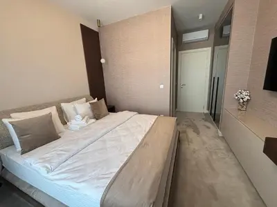 a large bed in a room with a large bed sidx sidx sidx at BW Aqua Lux Premium Apartman in Belgrade