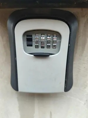a toaster oven is attached to a wall at Apartman Centar Surcin in Surčin