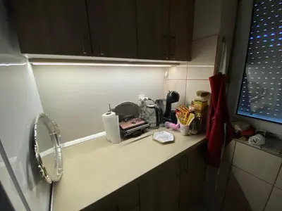 a kitchen counter with a toaster on top of it at Hopovske Terase in Irig