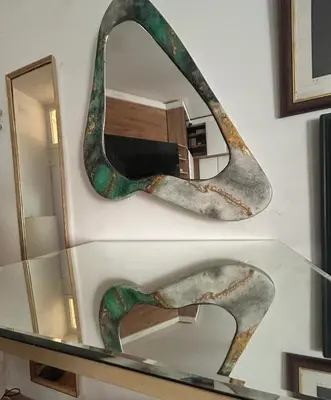 a large mirror on a wall in a museum at Lux Beba Pancevo in Pančevo