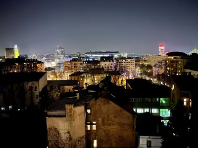 a view of a city at night with lights at Gajba Apartment in Belgrade