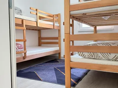 a room with bunk beds in a dorm room at Belgrade Airport Luxury single bed in Surčin