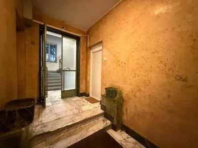 an empty room with a door and a window at Luxi TOP in Belgrade