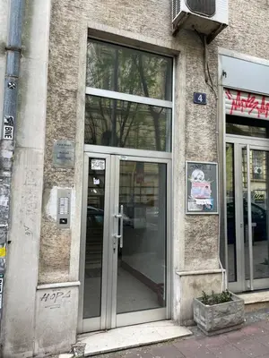 an entrance to a building with glass doors at Apartment Duchess in Belgrade