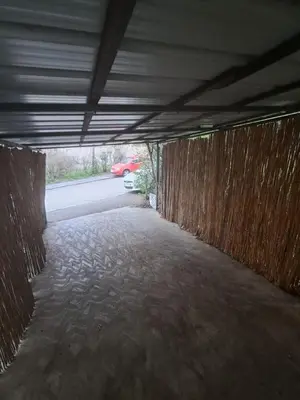 a tunnel with a car parked in a parking lot at Apartman Palma in Belgrade
