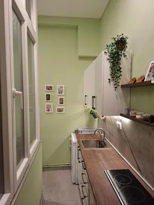 a kitchen with a sink and a counter top at La Pastorela in Belgrade