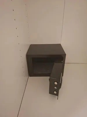 a black object sitting in a wall at La Pastorela in Belgrade