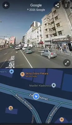 an image of a city street with cars on the road at La Pastorela in Belgrade