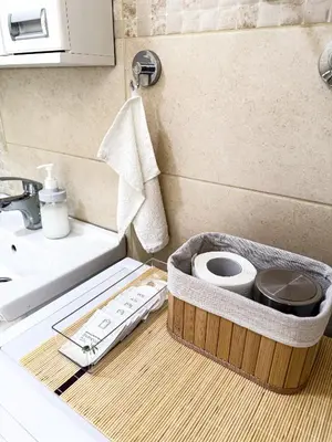 a bathroom with a toilet and a sink at Limpio Apartman in Belgrade