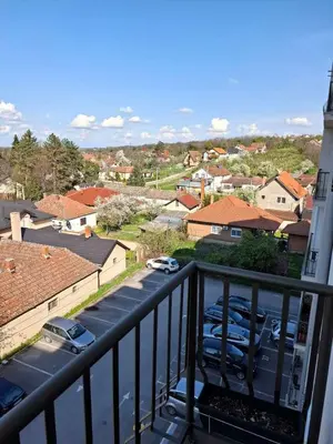 a balcony with a view of a parking lot at Stan na dan Ub in Ub